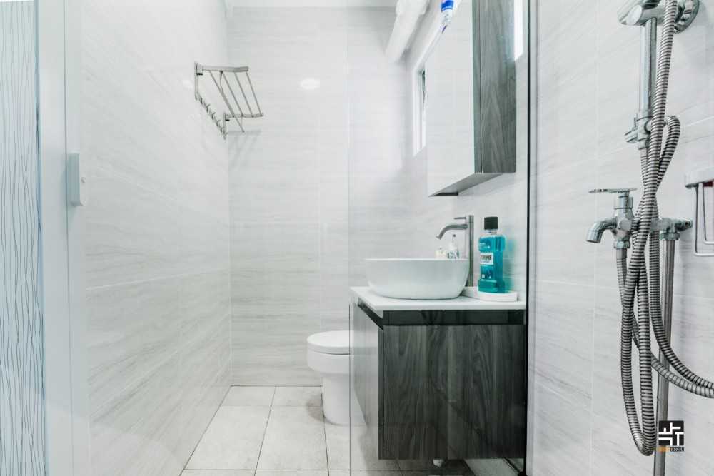 Modern Bathroom with Countertop and Herringbone Tiling