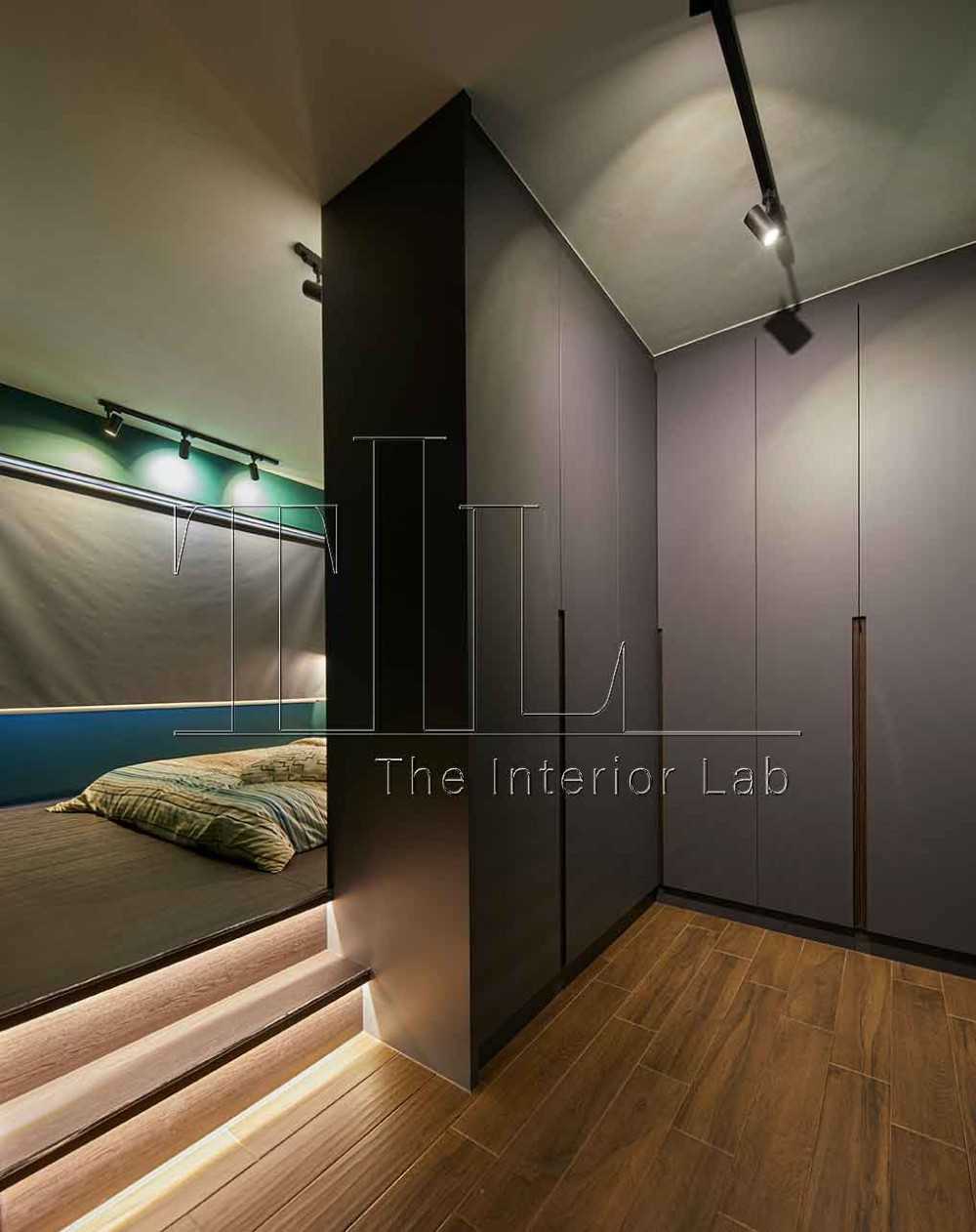 Industrial Walk-in Wardrobe with Parquet Floor and Staircase