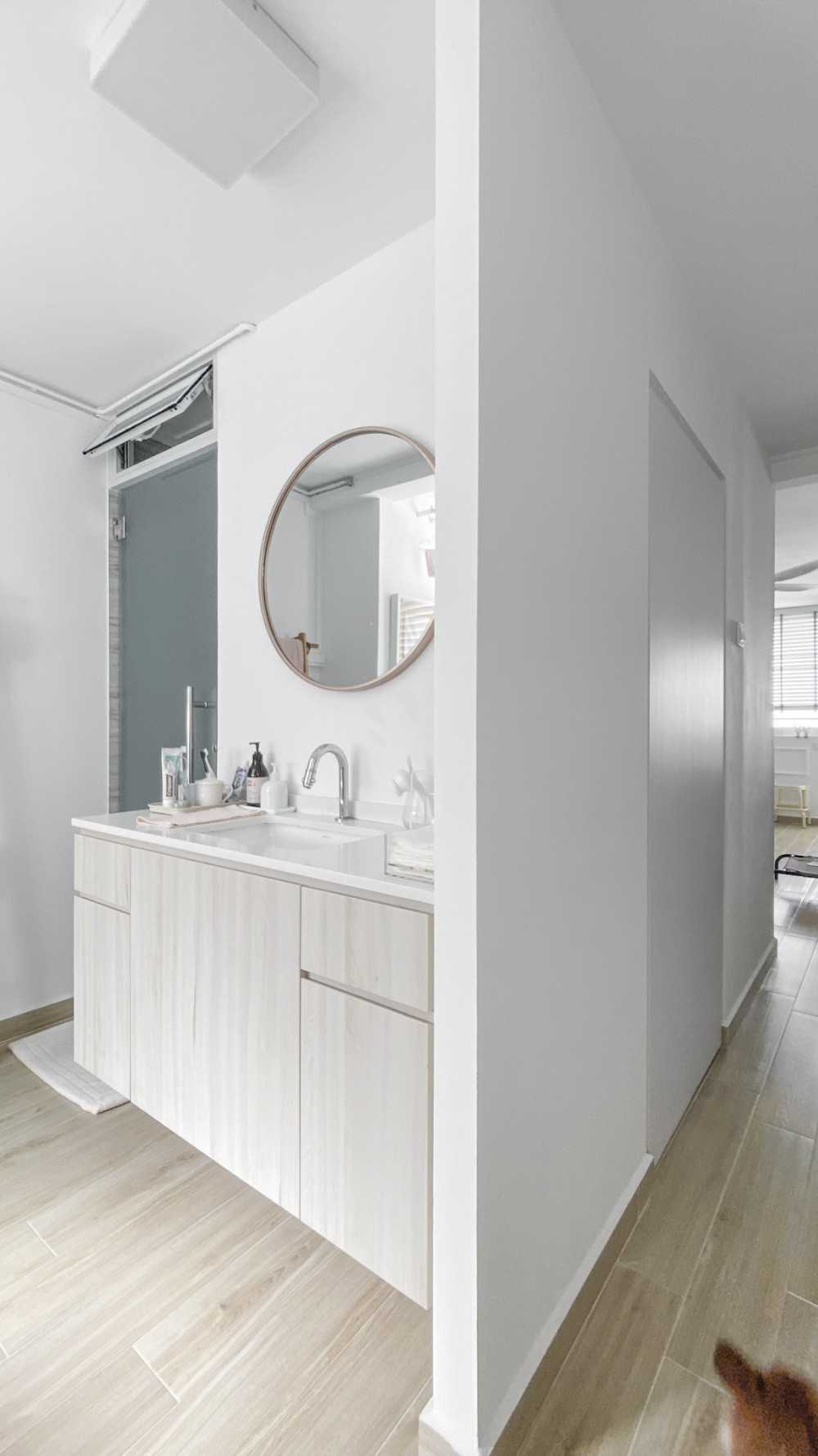 Minimalist Hallway with Mirror and Ceiling Light