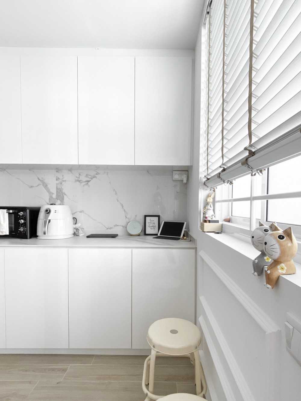 Minimalist Kitchen with Countertop and Cupboard