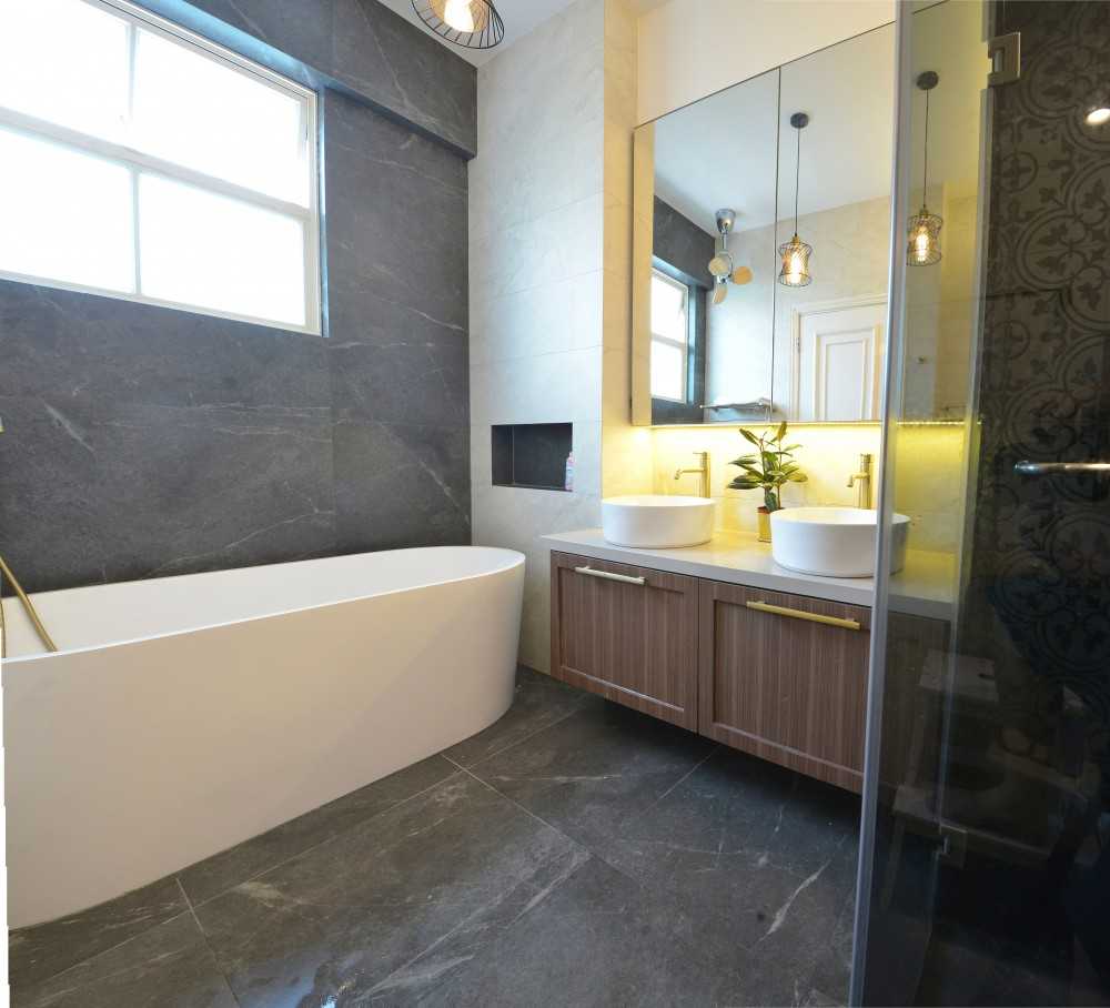 Modern Bathroom with Countertop and Herringbone Tiling