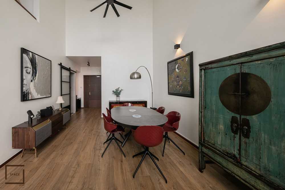 Eclectic Living Room with Drop Light and Sofa