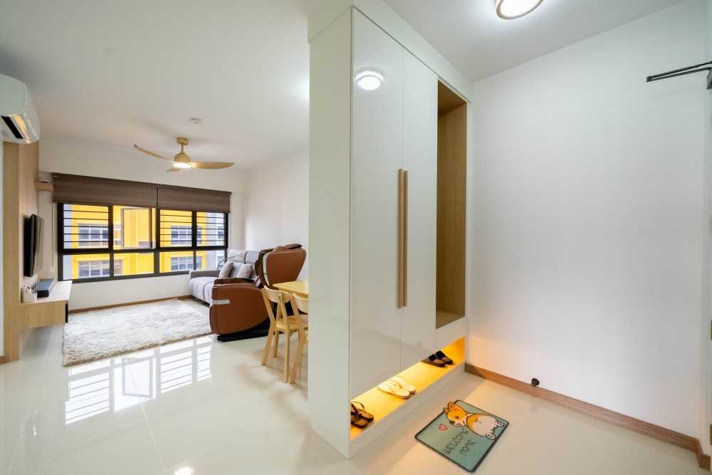 Scandinavian Living Room with Homogeneous Tiles and TV Console
