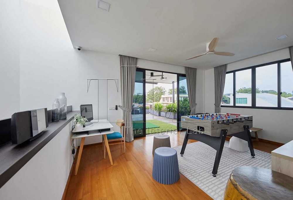 Contemporary Gaming Room with Parquet Floor and Ceiling Fan