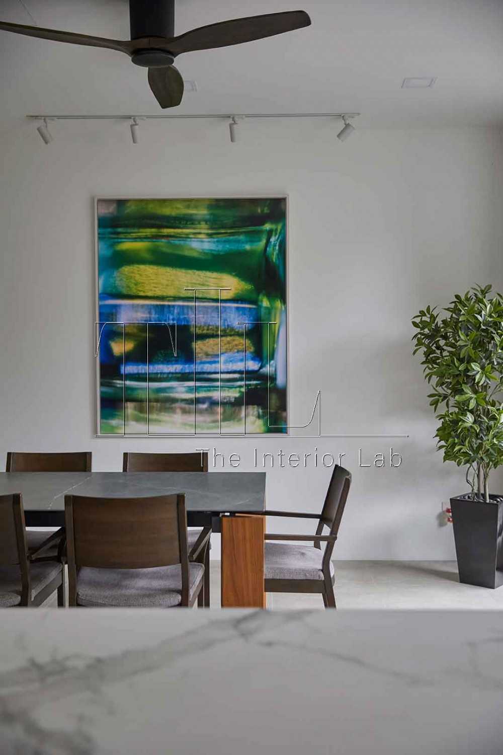 Contemporary Dining Room with Countertop and Artwork