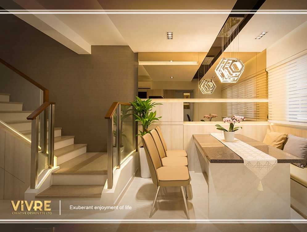 Modern Dining Room with Cove Lighting and Chandelier