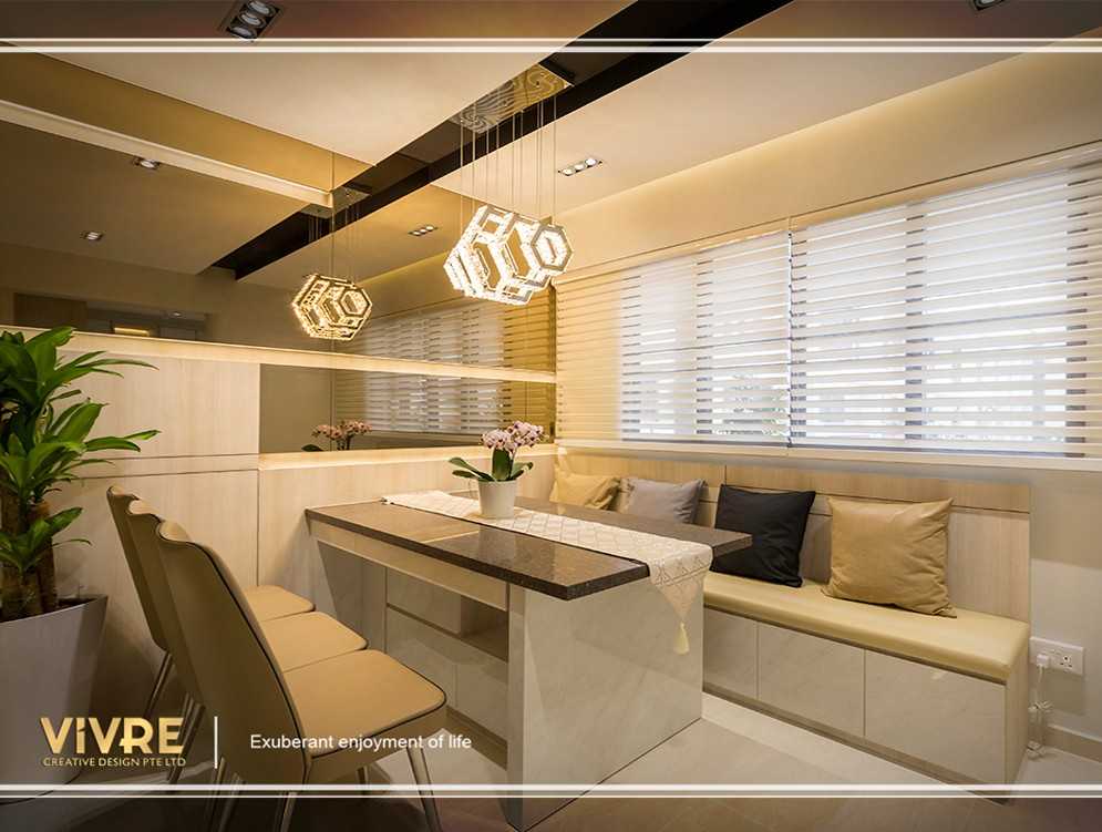 Modern Dining Room with Cove Lighting and Chandelier