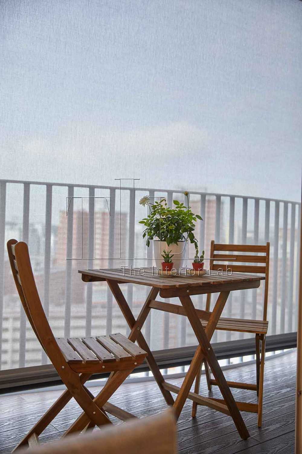 Modern Balcony with Bay Window and Outdoor Table