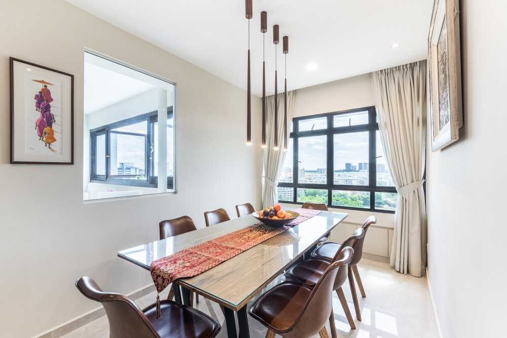 Contemporary Dining Room with Chandelier and Dining Table