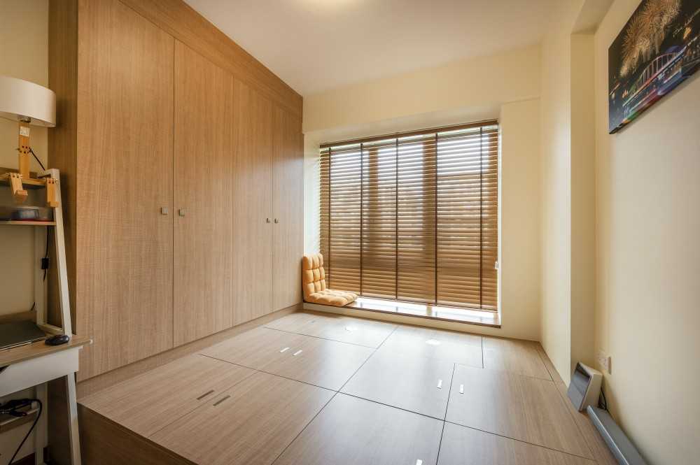 Asian Bedroom with Platform Bed and Wood Flooring