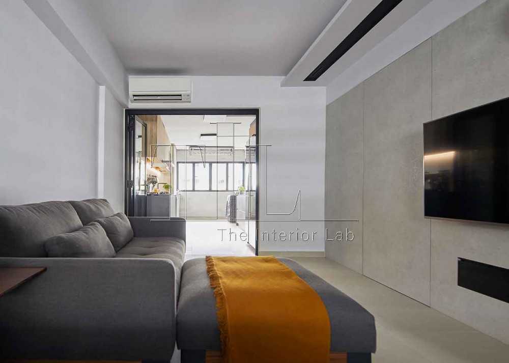 Contemporary Living Room with Homogeneous Tiles and Feature Wall
