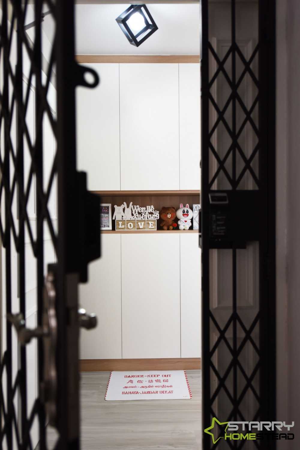 Scandinavian Entryway with Shoe Cabinets and Doors