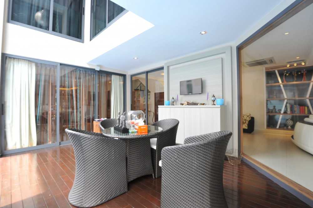 Minimalist Balcony with Bay Window and Curtain