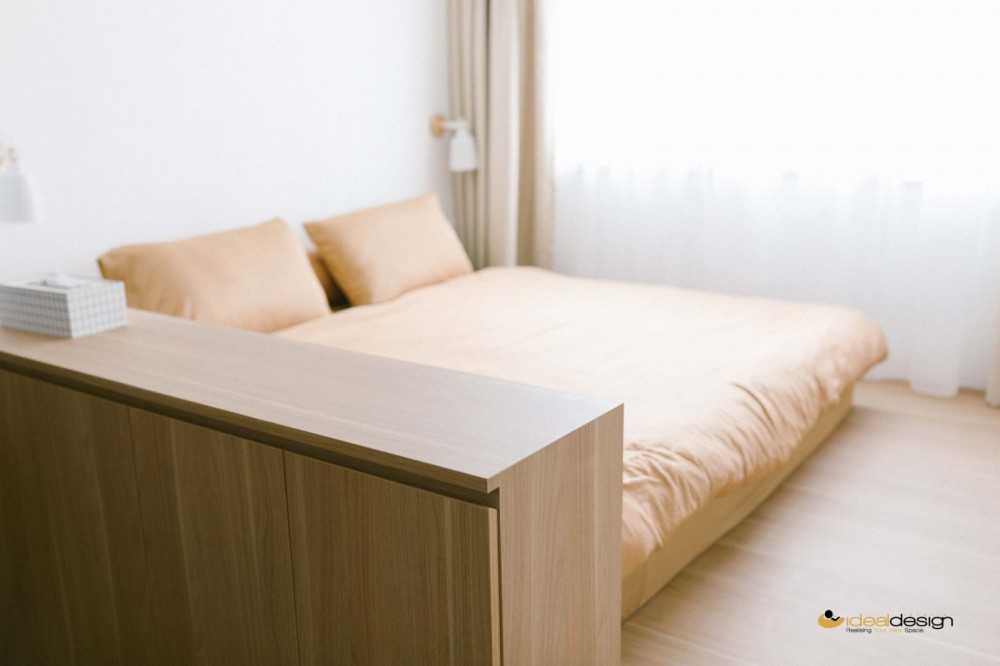 Contemporary Bedroom with Bookshelf and Sideboard
