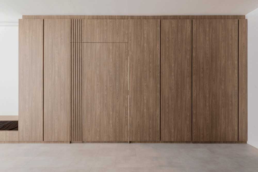 Minimalist Living Room with Feature Wall and Cove Lighting