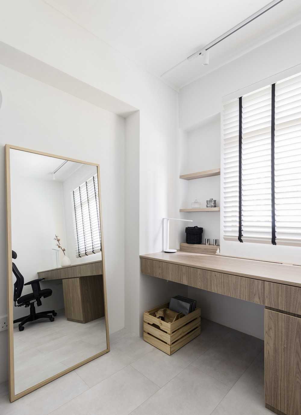 Minimalist Study with Bookshelf and Chandelier