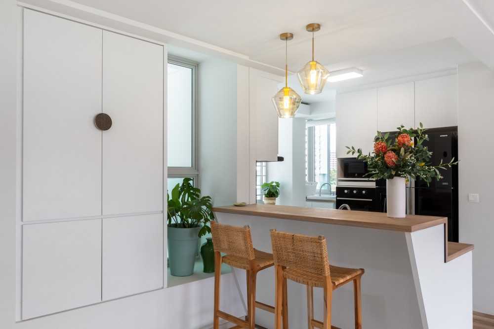 Scandinavian Home Bar with Countertop and Chandelier