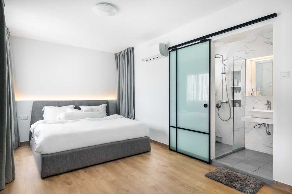 Minimalist Bedroom with Vinyl Flooring and Cove Lighting