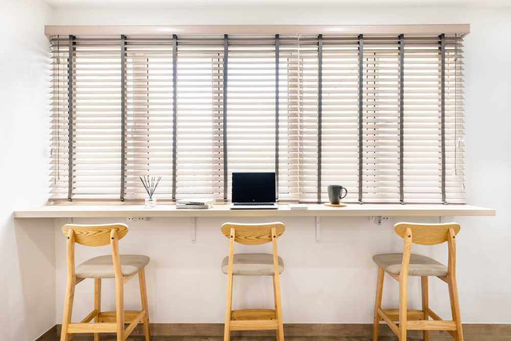 Minimalist Study with Vinyl Flooring and Window Seat