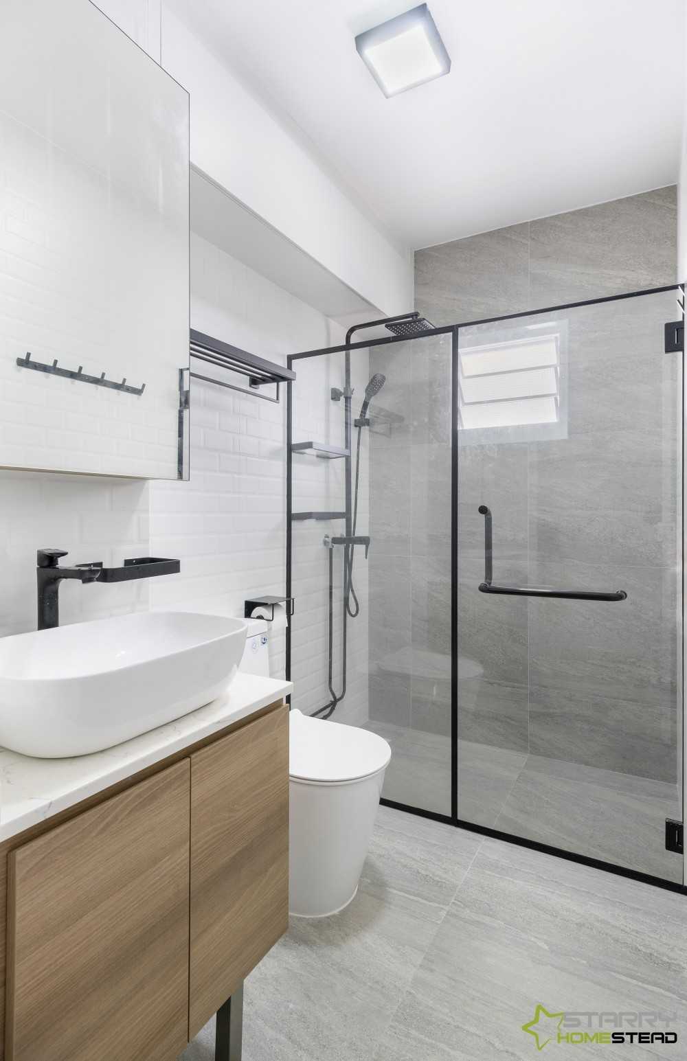 Scandinavian Bathroom with Showers and Toilet Bowl