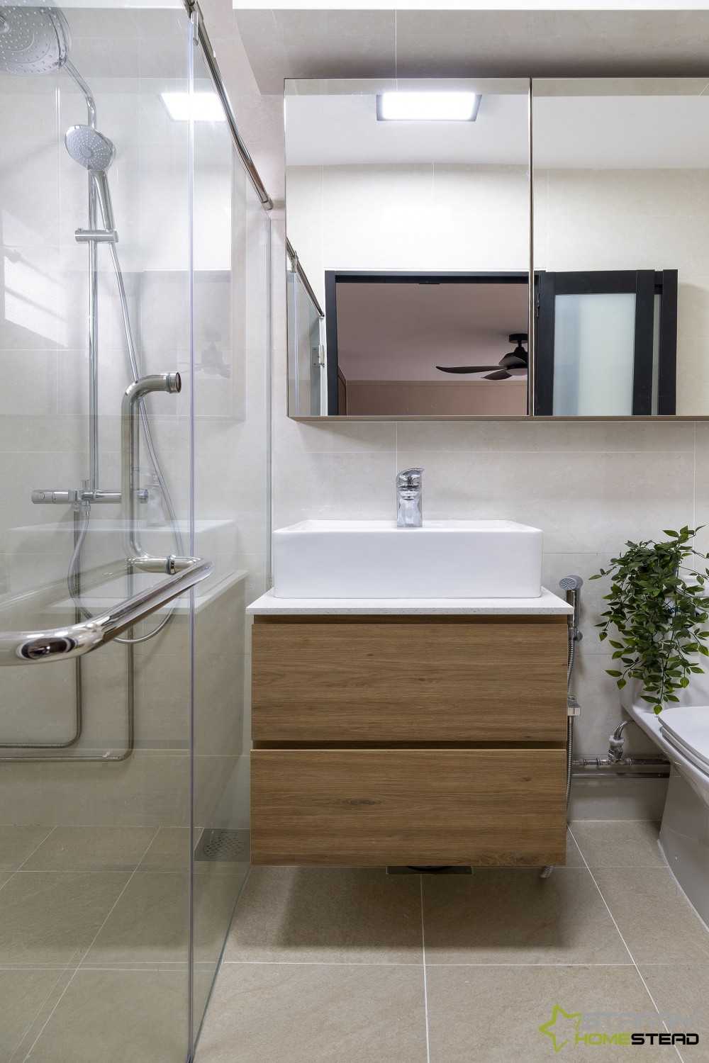 Scandinavian Bathroom with Showers and Toilet Bowl