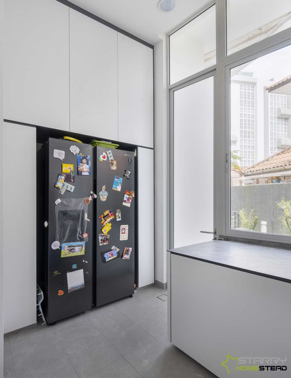 Modern Kitchen with Kitchen Cabinets and Refrigerator