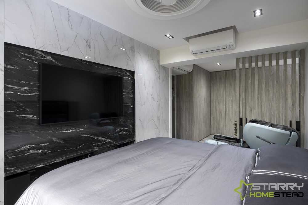 Contemporary Bedroom with TV and Bed