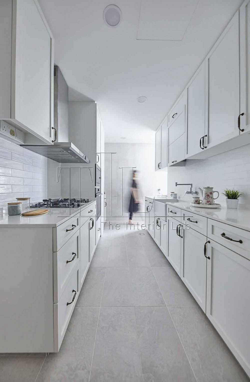 Minimalist Kitchen with Countertop and Homogeneous Tiles