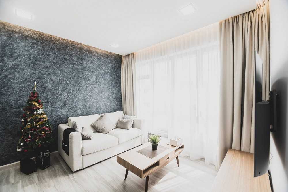 Minimalist Living Room with Vinyl Flooring and Feature Wall