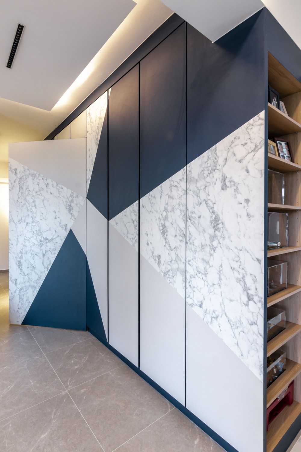 Scandinavian Walk-in Wardrobe with Cove Lighting and Wardrobe