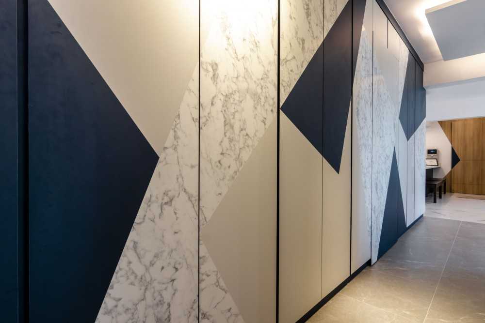 Scandinavian Walk-in Wardrobe with Feature Wall and Cove Lighting