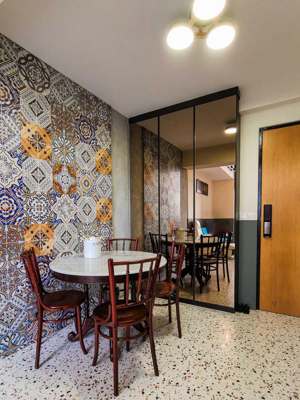 Eclectic Dining Room with Feature Wall and Mirror