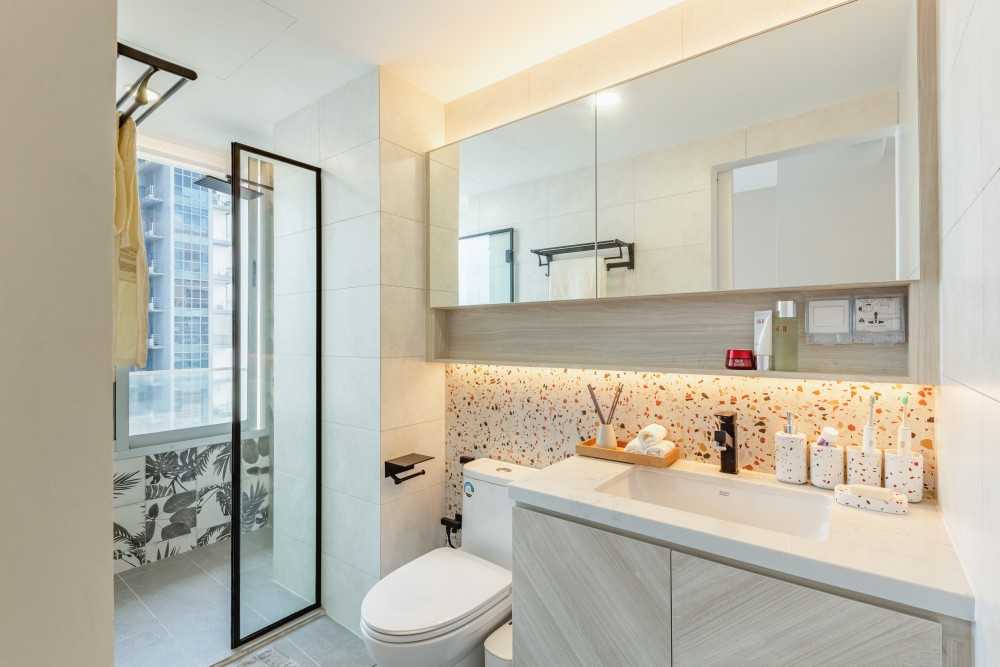Scandinavian Bathroom with Herringbone Tiling and Showers