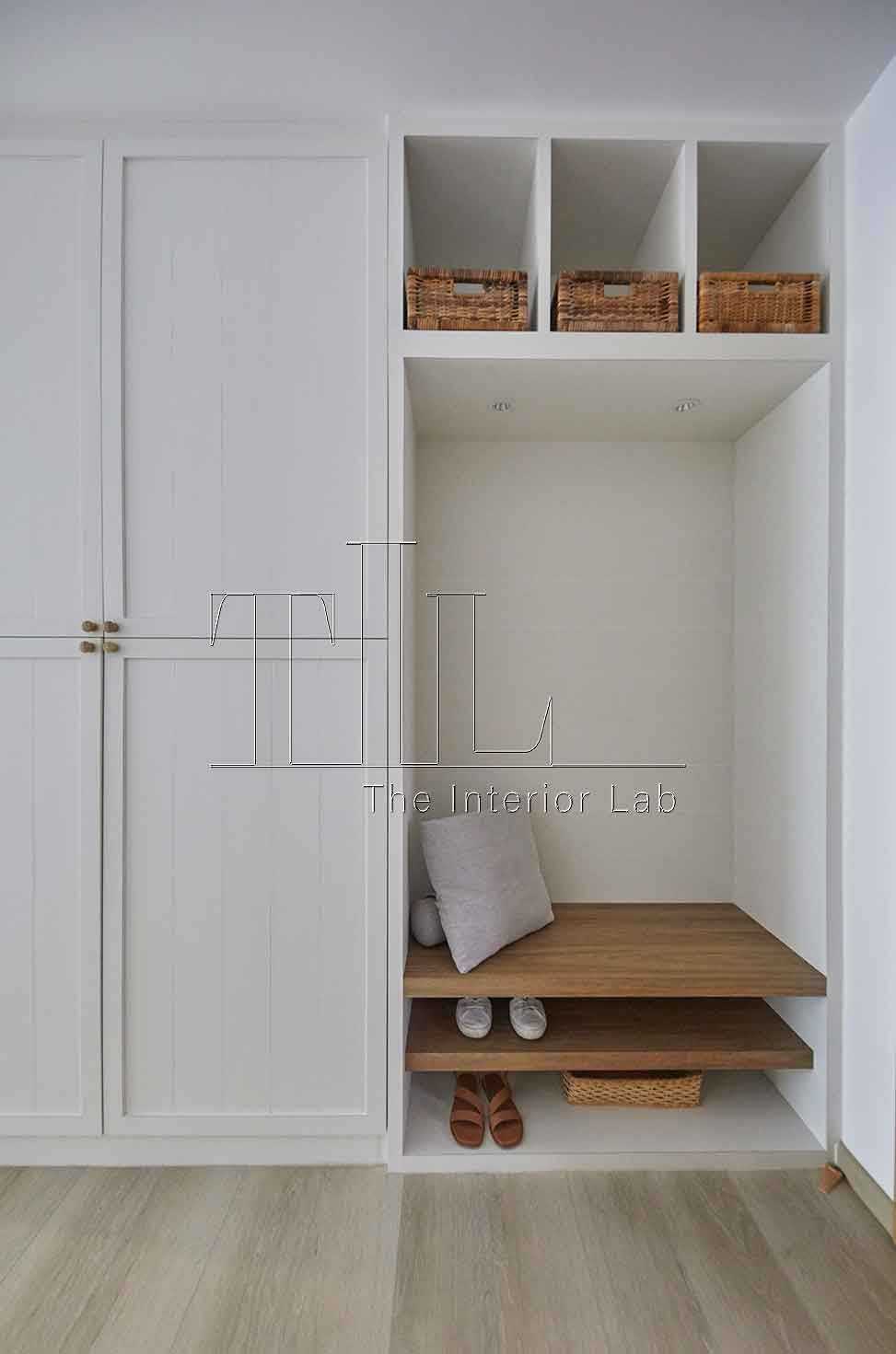 Country Entryway with Wood Flooring and Seating Bench
