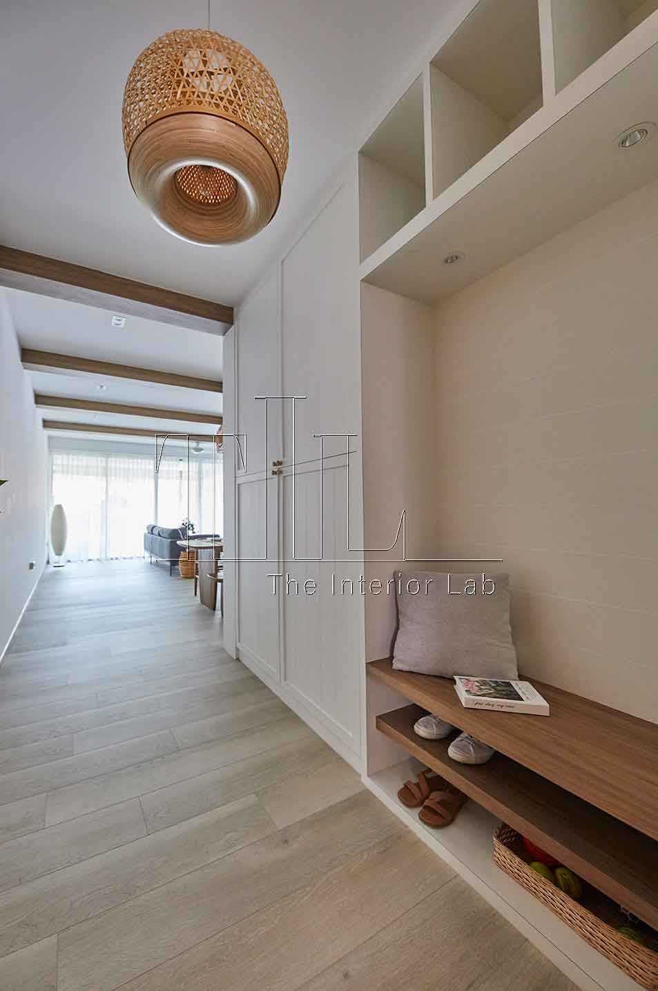 Country Entryway with Wood Flooring and Seating Bench