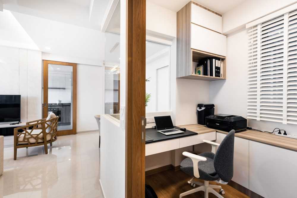Minimalist Study with Bookshelf and Ceiling Light