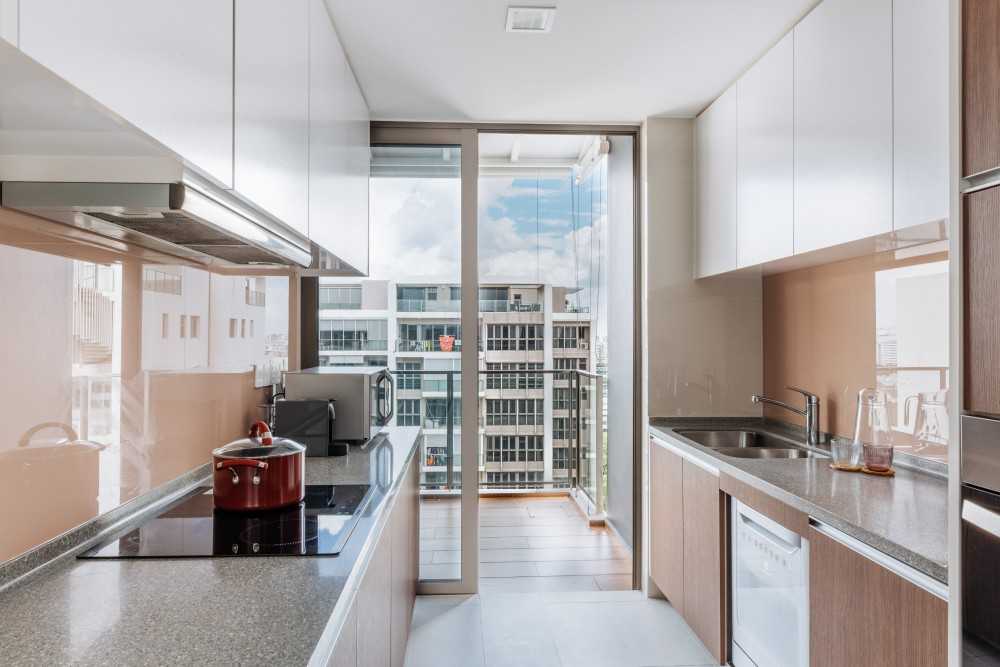 Asian Kitchen with Countertop and Homogeneous Tiles