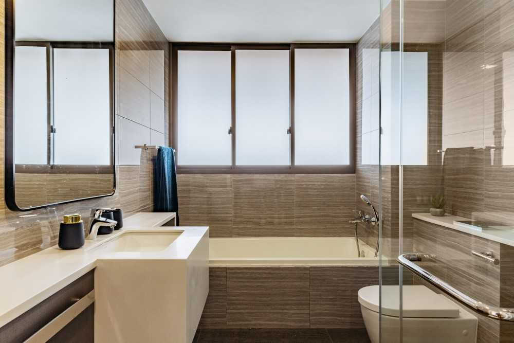 Asian Bathroom with Mirror and Bathtub