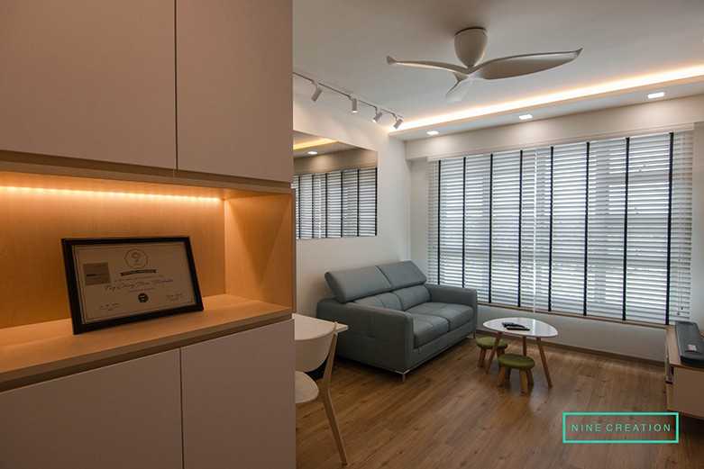 Modern Living Room with TV Console and Cove Lighting