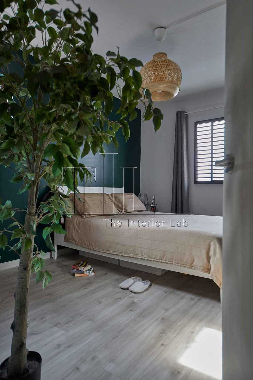 Contemporary Bedroom with Vinyl Flooring and Feature Wall