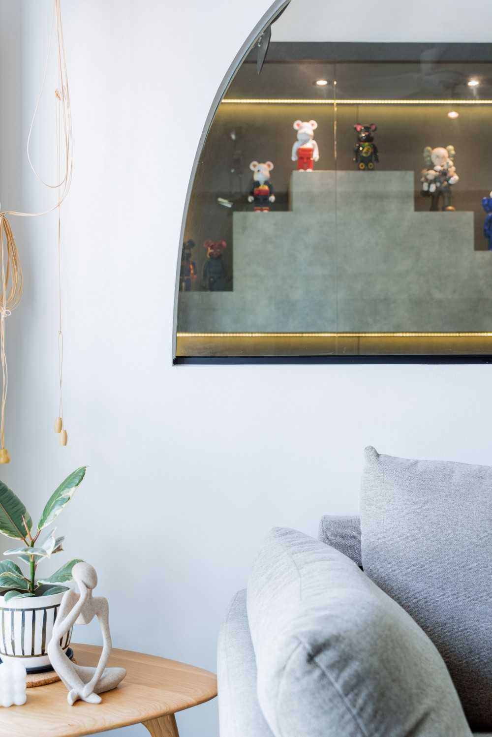Modern Living Room with Bookshelf and Feature Wall