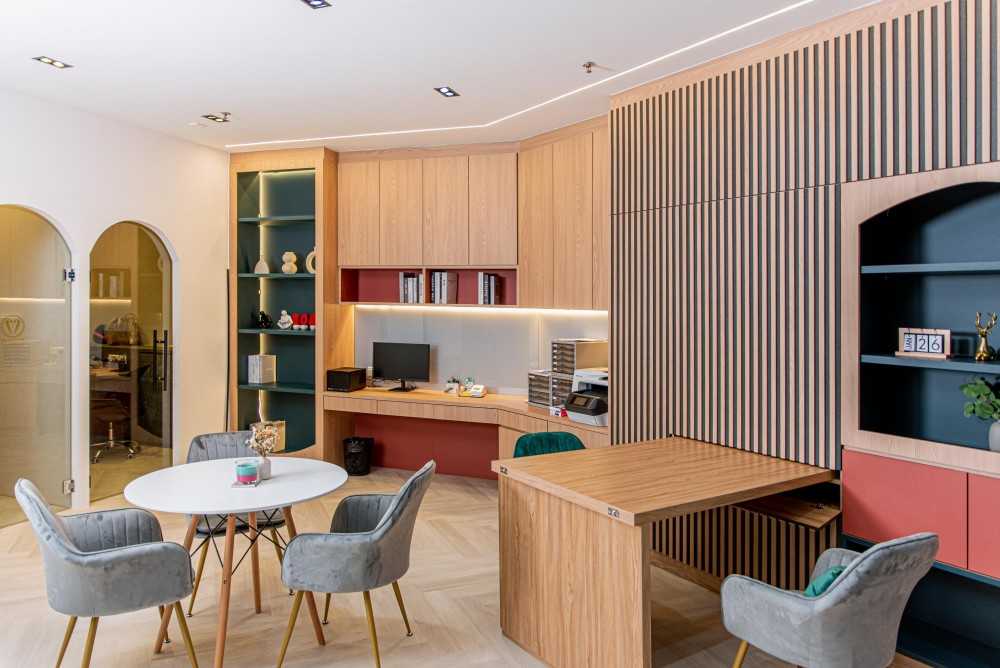 Eclectic Studio with Bookshelf and Sofa