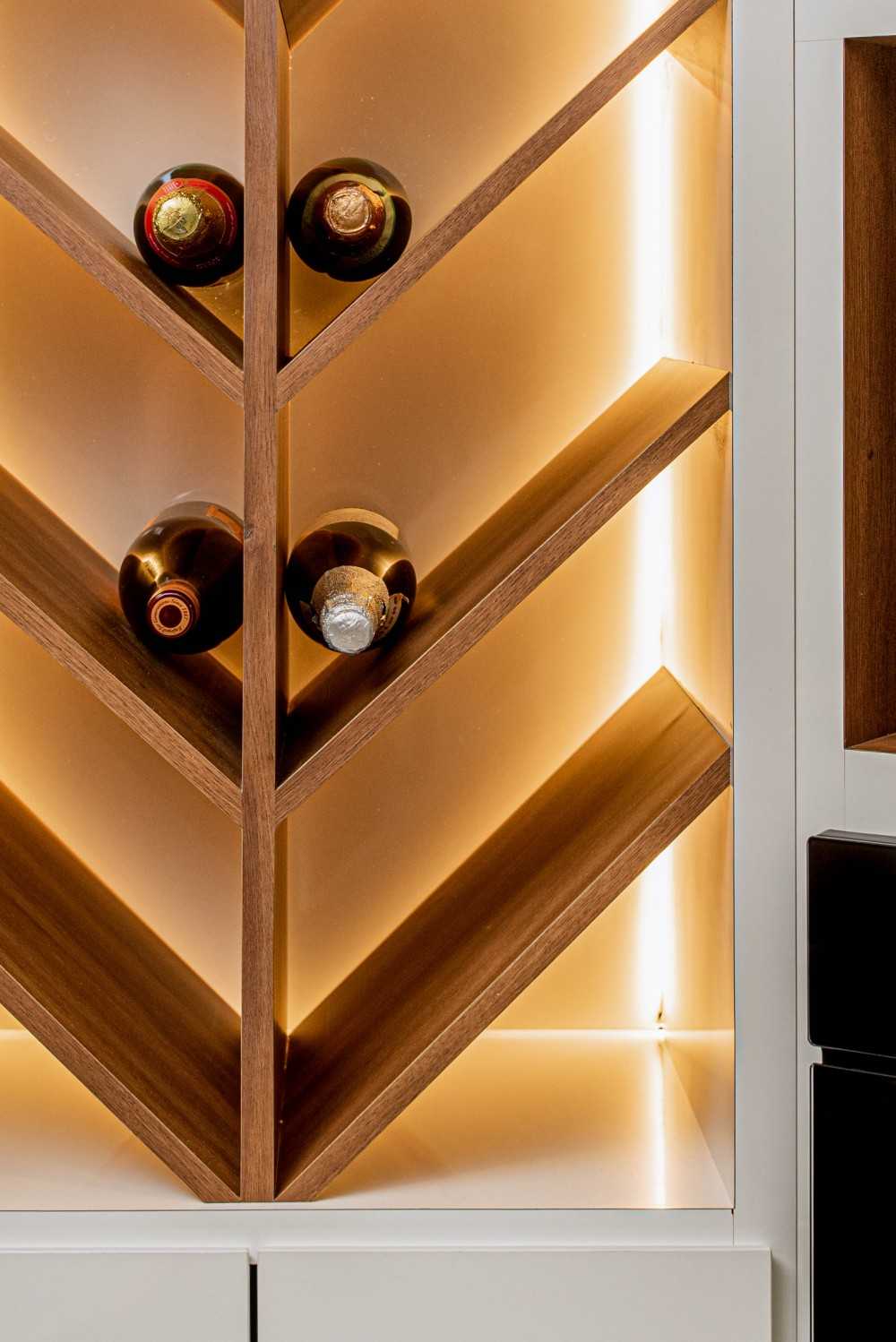 Eclectic Wine Cellar with Drinkware and Shelving Units