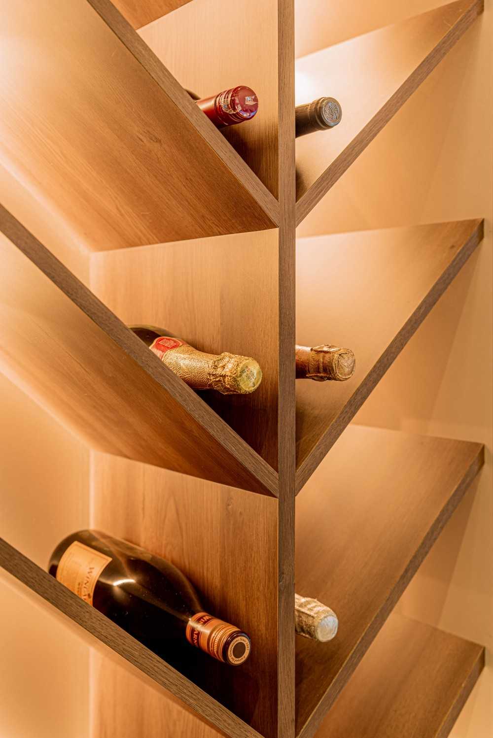 Eclectic Wine Cellar with Drinkware and Shelving Units