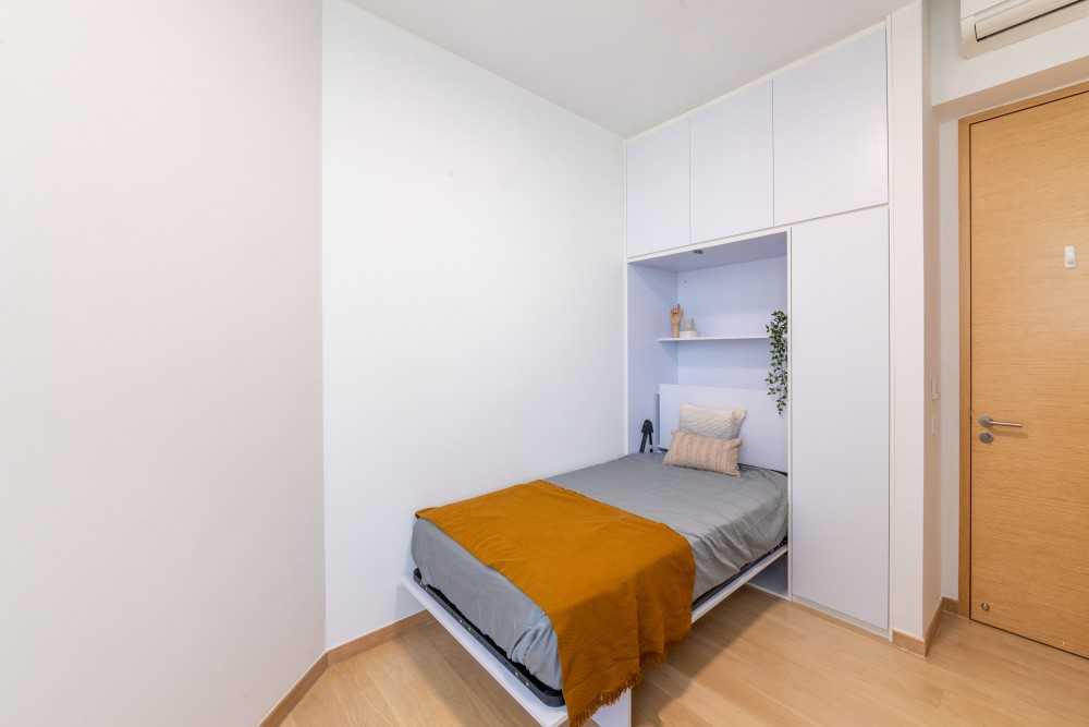 Minimalist Bedroom with Platform Bed and Wood Flooring