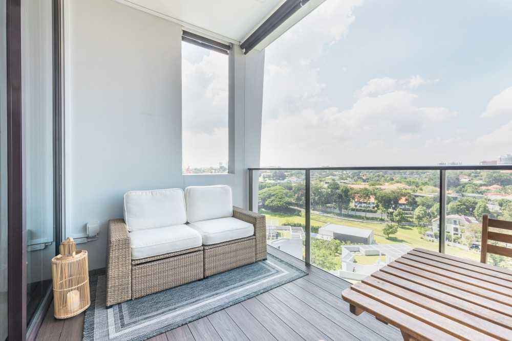 Minimalist Balcony with Window Seat and Outdoor Table