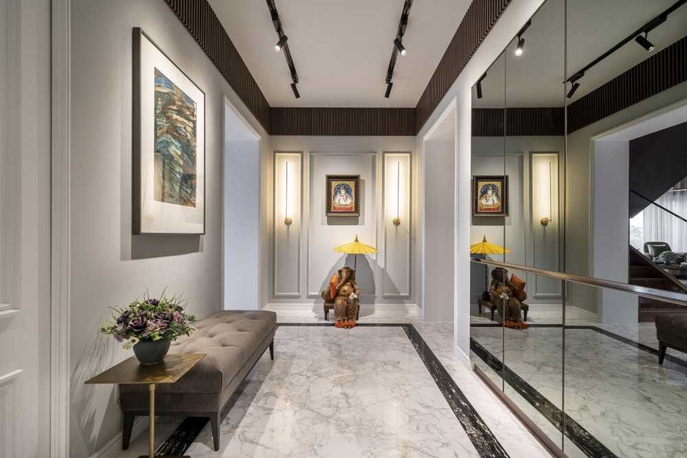 Contemporary Hallway with Drop Light and Mirror