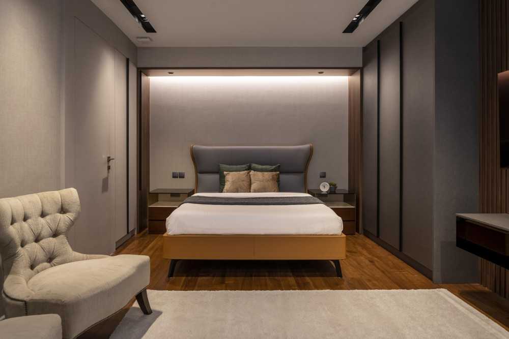 Contemporary Bedroom with Wood Flooring and Wardrobe