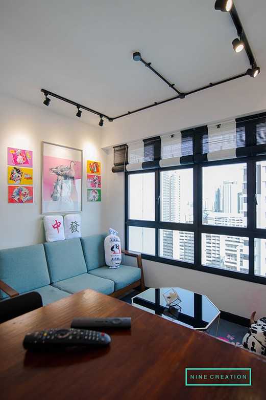 Asian Living Room with Roller Blinds and Sofa