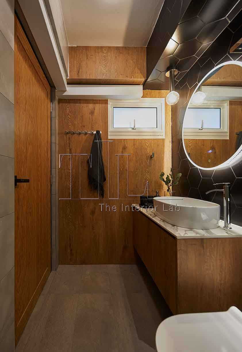 Industrial Bathroom with Countertop and Mirror